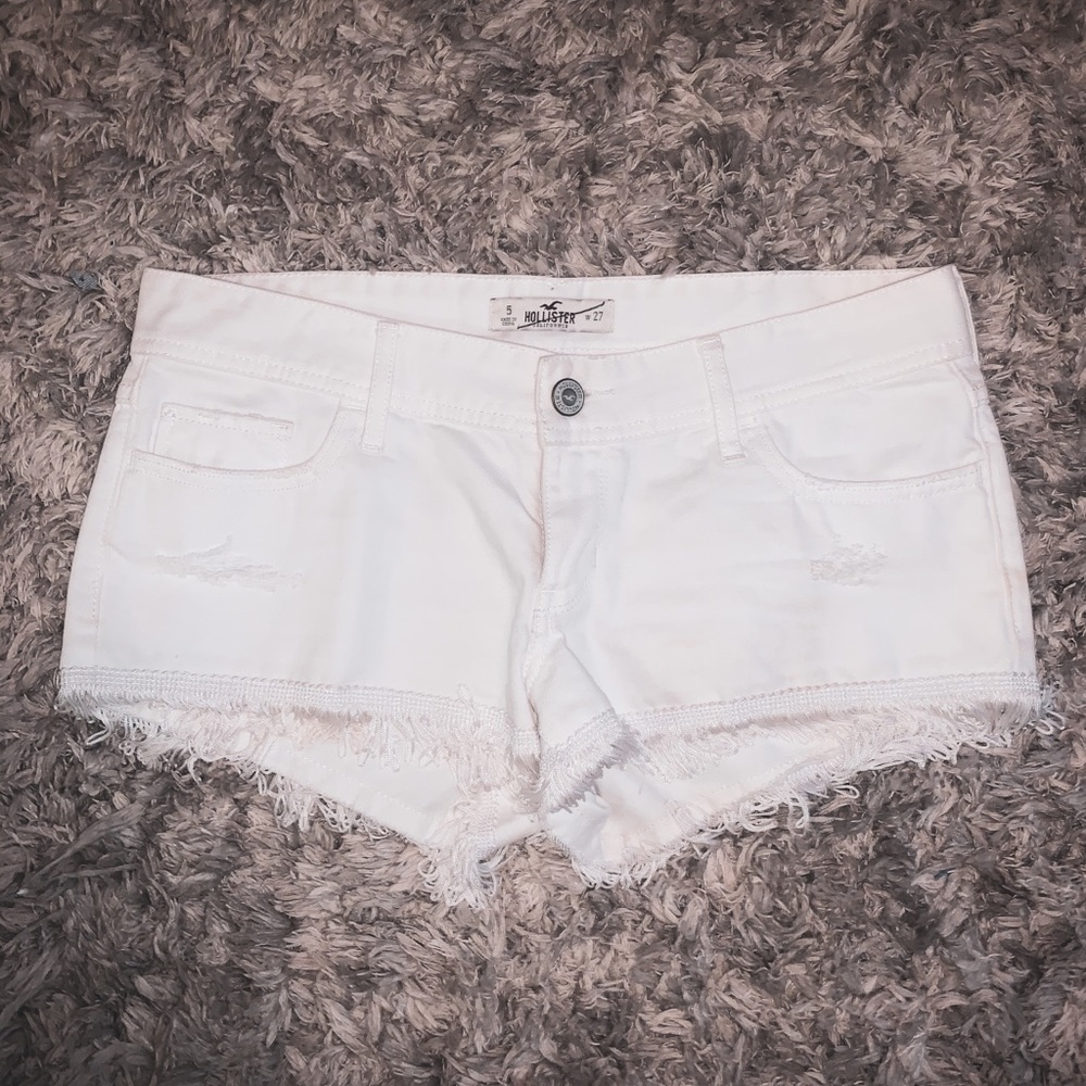 White hollister denim shorts with fringe